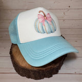 Light blue and white cap with a decorative pumpkin design for ladies
